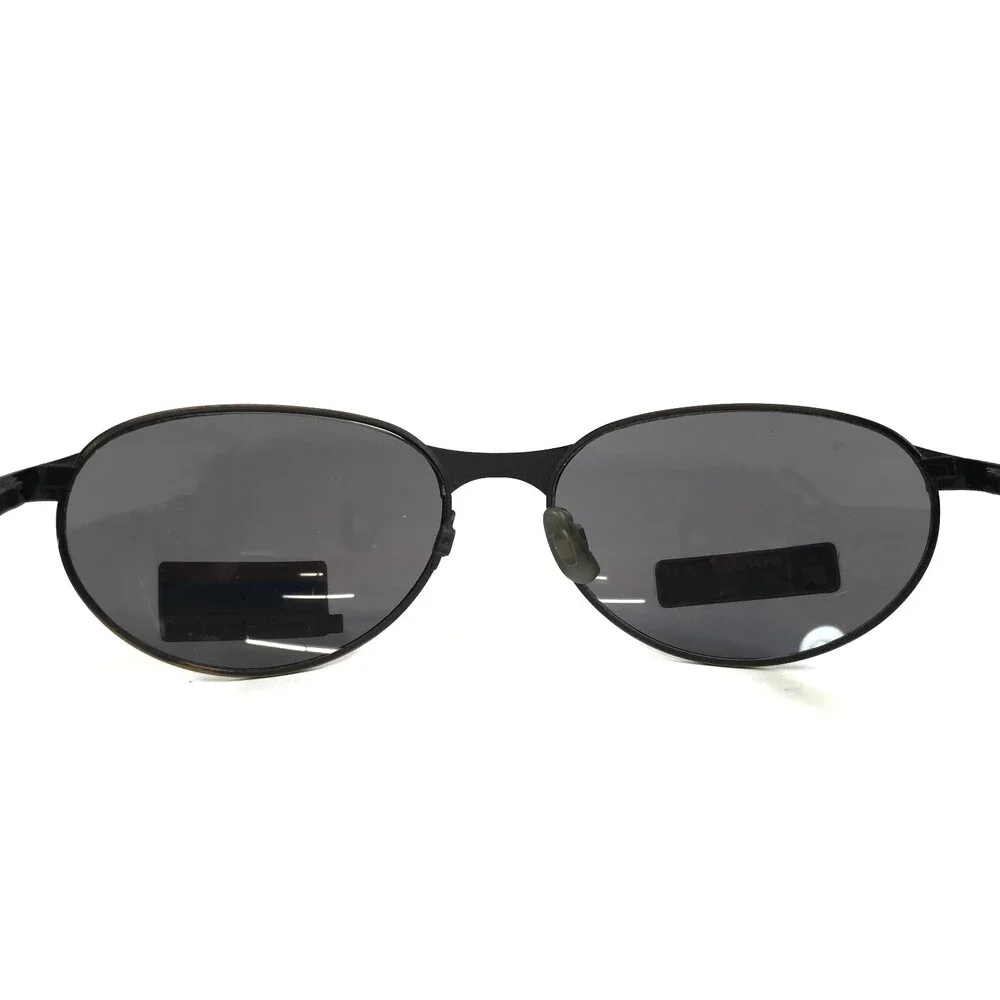 Foster Grant Sunglasses IRONMAN TL5-881 Gunmetal Gold Oval Frames w/ Gray Lenses